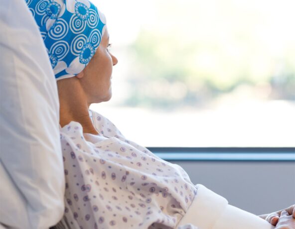 Person undergoing cancer treatment